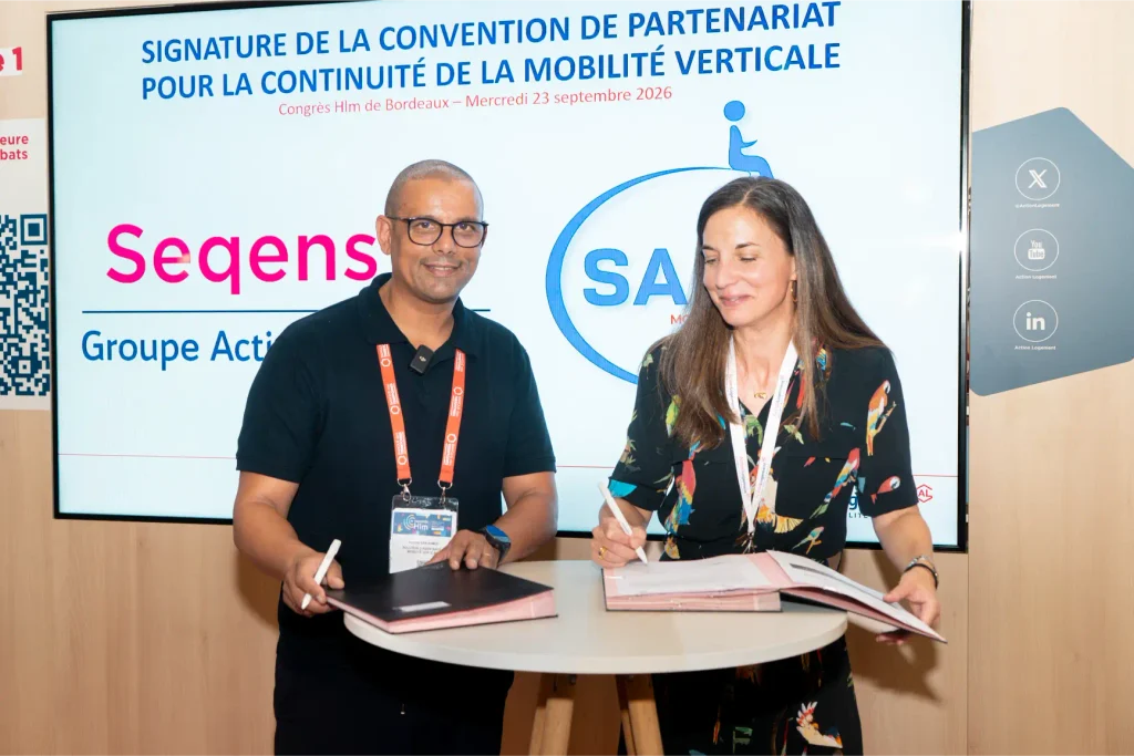 SIgnature du partenariat avec Seqens sur le stand de Action Logement.